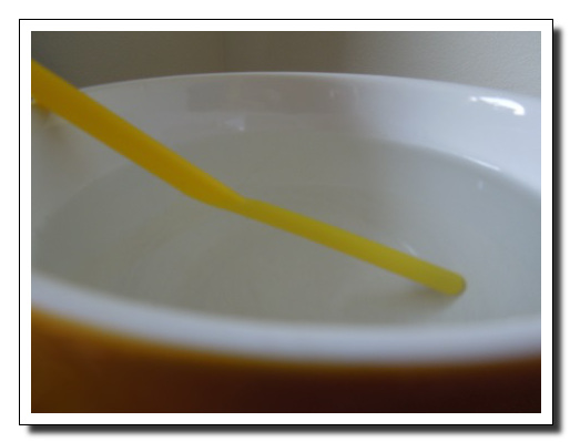 A straw in a glass appears bent.